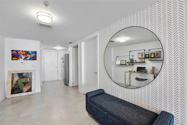 a balcony with furniture and flowers