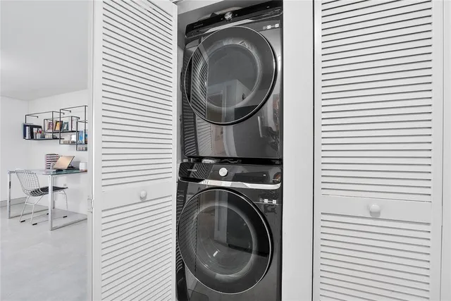 a swimming pool with outdoor seating and yard