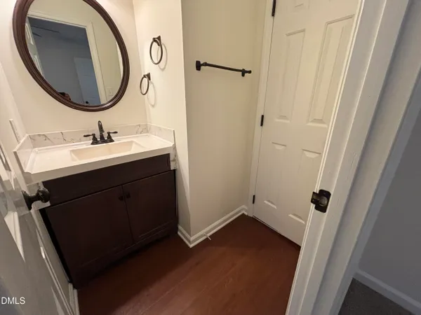 a bathroom with a shower a toilet and a sink