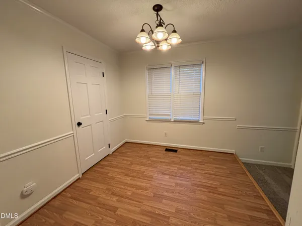 a view of a livingroom with a staircase