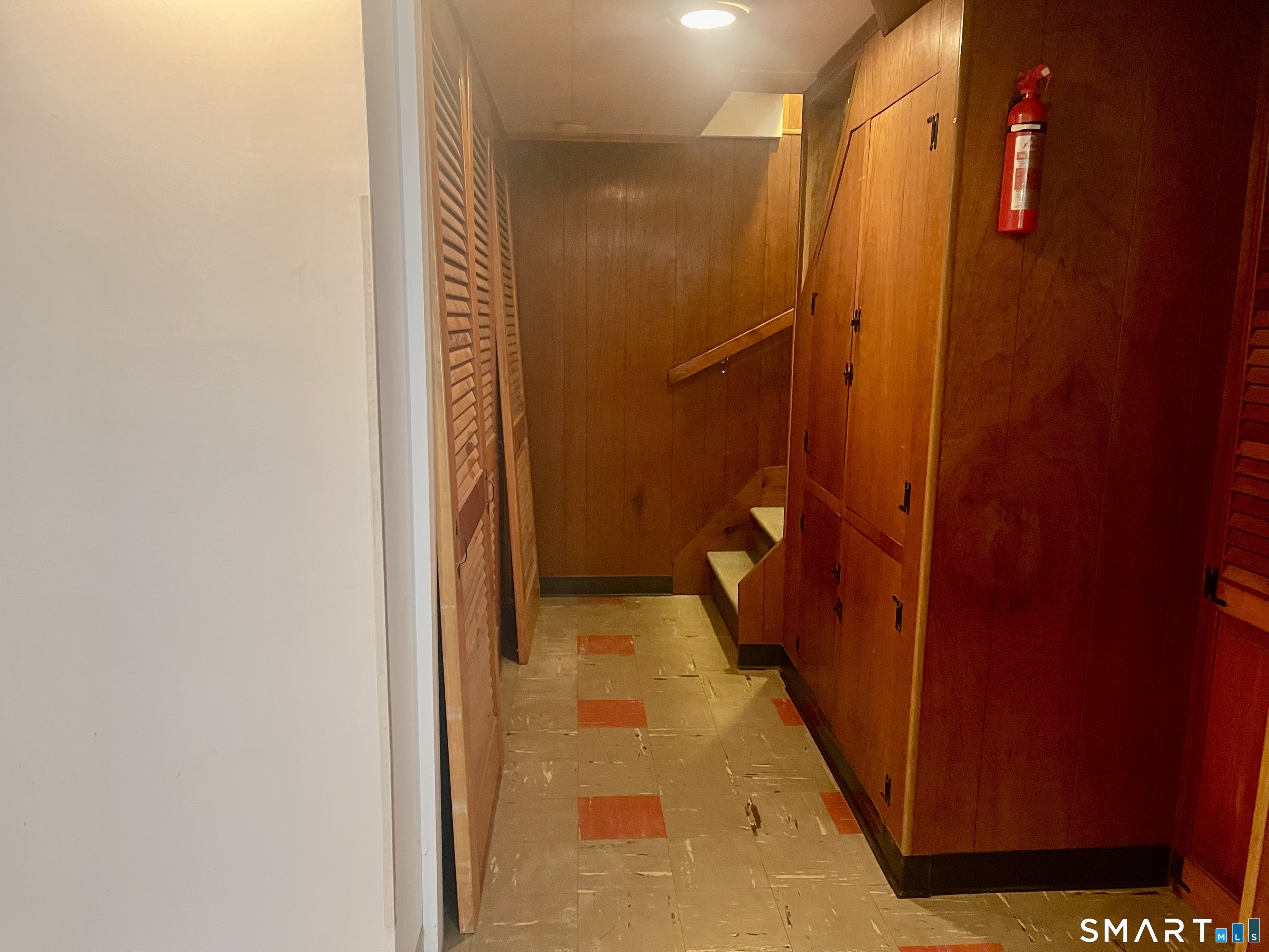 9 Apple Lane Redding, CT 06896 - Photo 11 of 39 Hallway to stairway up to the main level