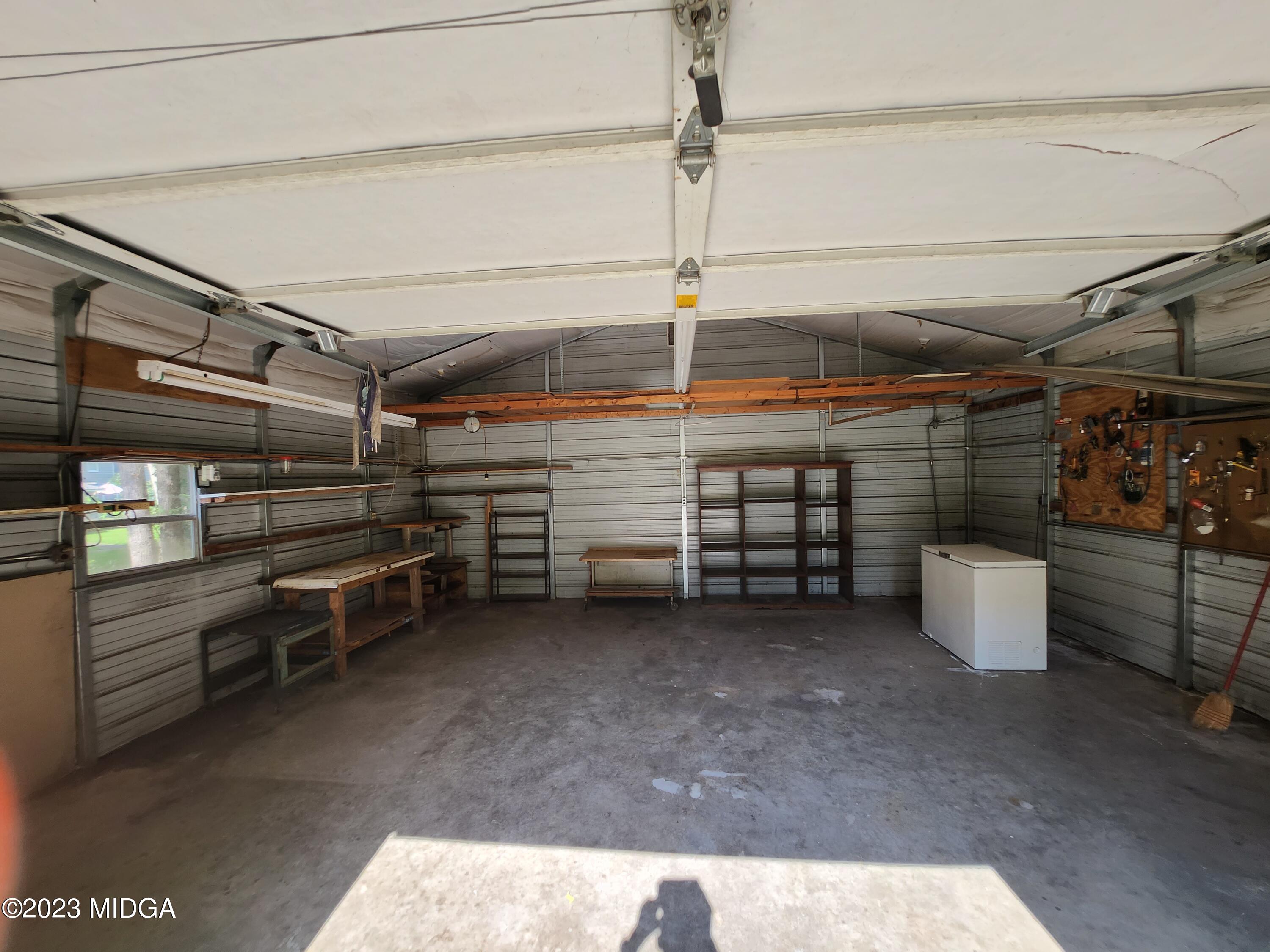 7338 Columbus Road Lizella, GA 31052 - Photo 11 of 33 a view of a storage room