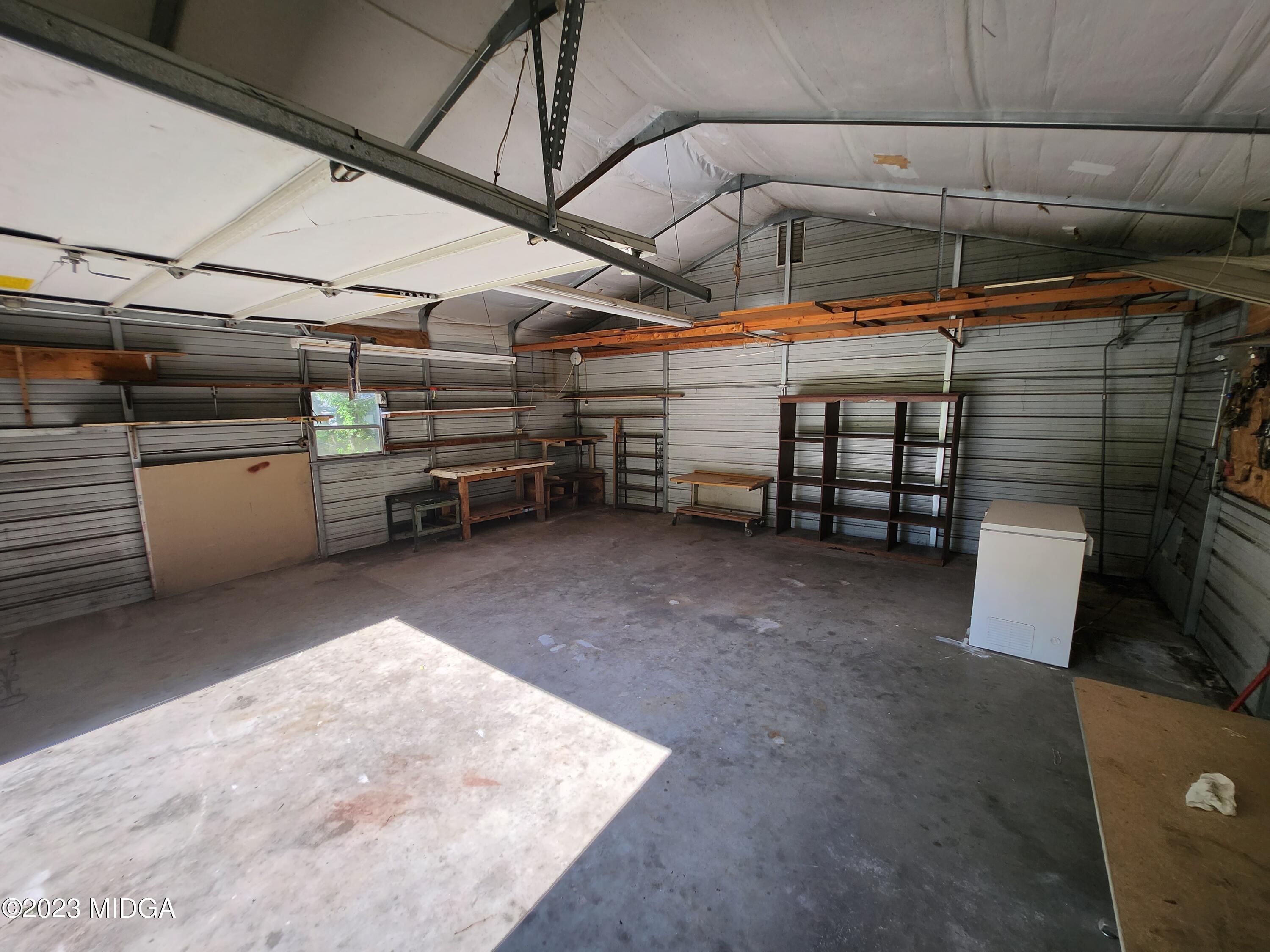7338 Columbus Road Lizella, GA 31052 - Photo 13 of 33 a view of a garage room