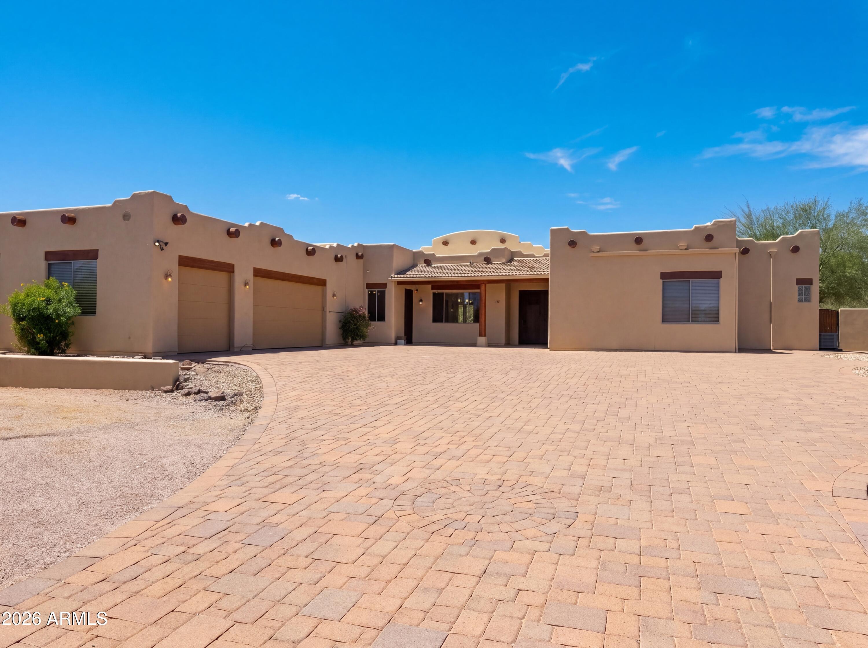 4496 South Kings Ranch Road Gold Canyon, AZ 85118 - Photo 1 of 22 a view of a house with a large space