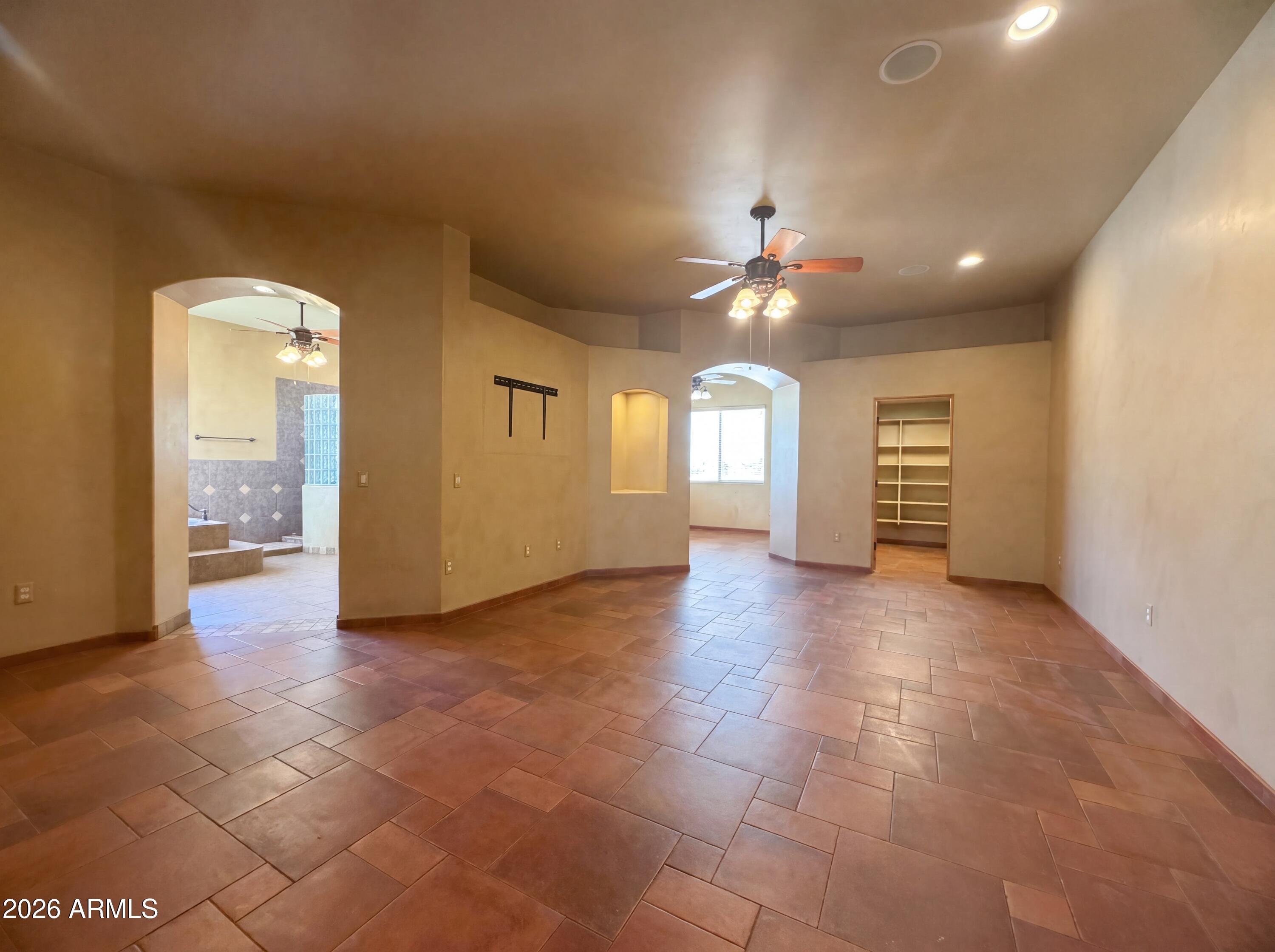 4496 South Kings Ranch Road Gold Canyon, AZ 85118 - Photo 3 of 22 a view of a room with chandelier and entryway