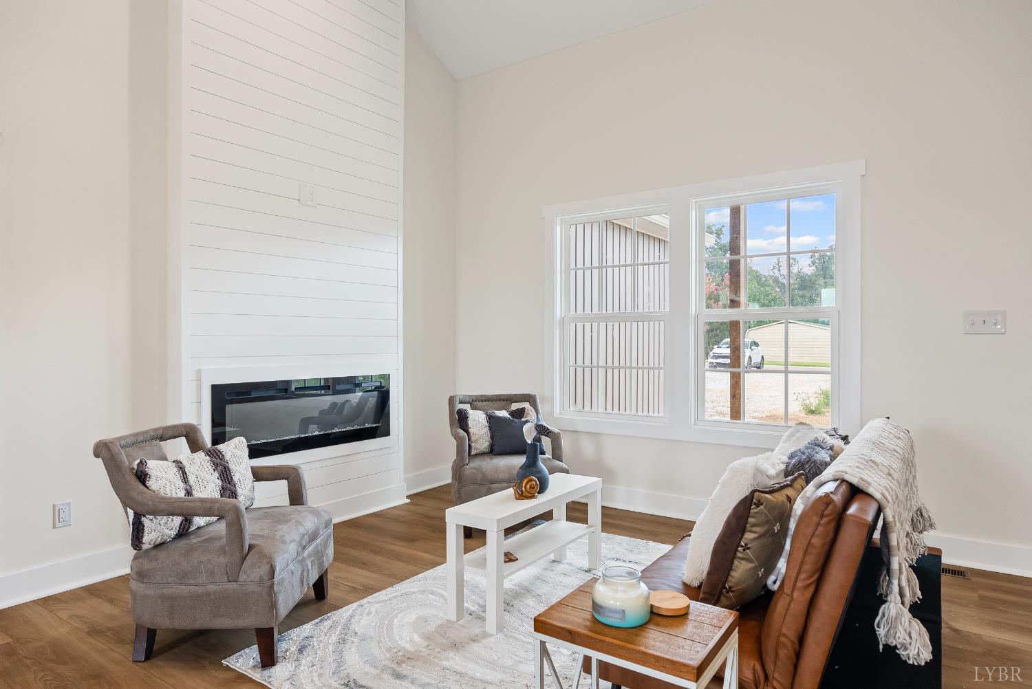 2 Hales Ford Road Moneta, VA 24121 - Photo 2 of 39 a living room with furniture fireplace and a flat screen tv