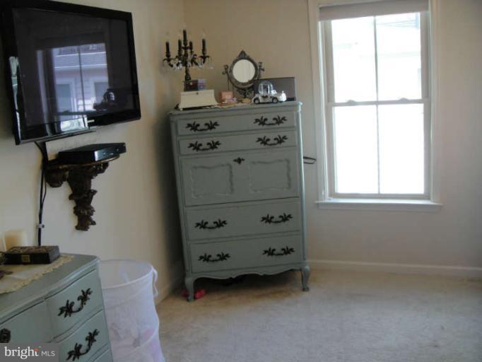 3405 Kemper Road Arlington, VA 22206 - Photo 20 of 30 a view of room with window and cabinet