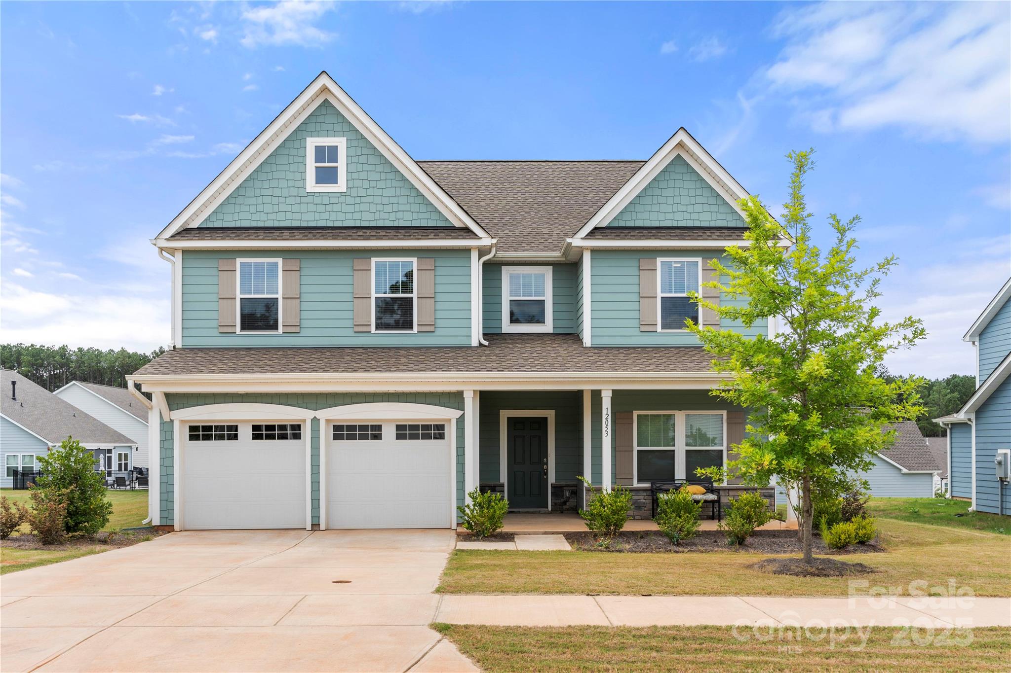 12053 Sam Snead Court Lancaster, SC 29720 - Photo 1 of 48 a front view of a house with a yard