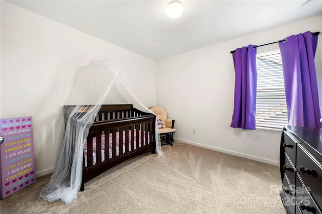 a view of entryway with a window and furniture