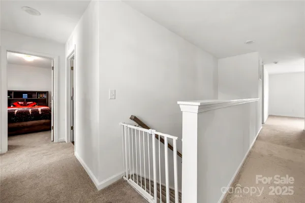 a view of a livingroom with a car parked in garage