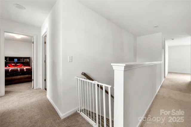 a view of a livingroom with a car parked in garage