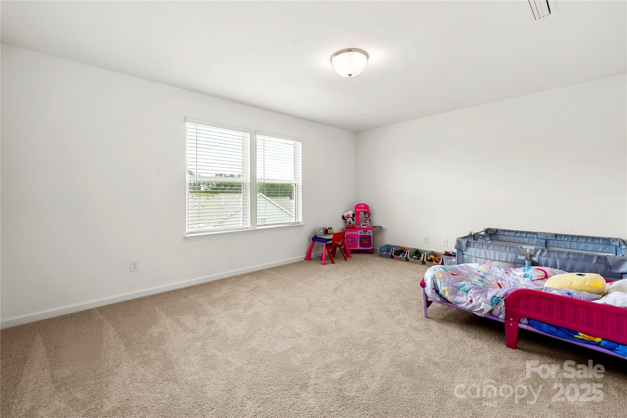12053 Sam Snead Court Lancaster, SC 29720 - Photo 29 of 48 a bedroom with two beds and a window