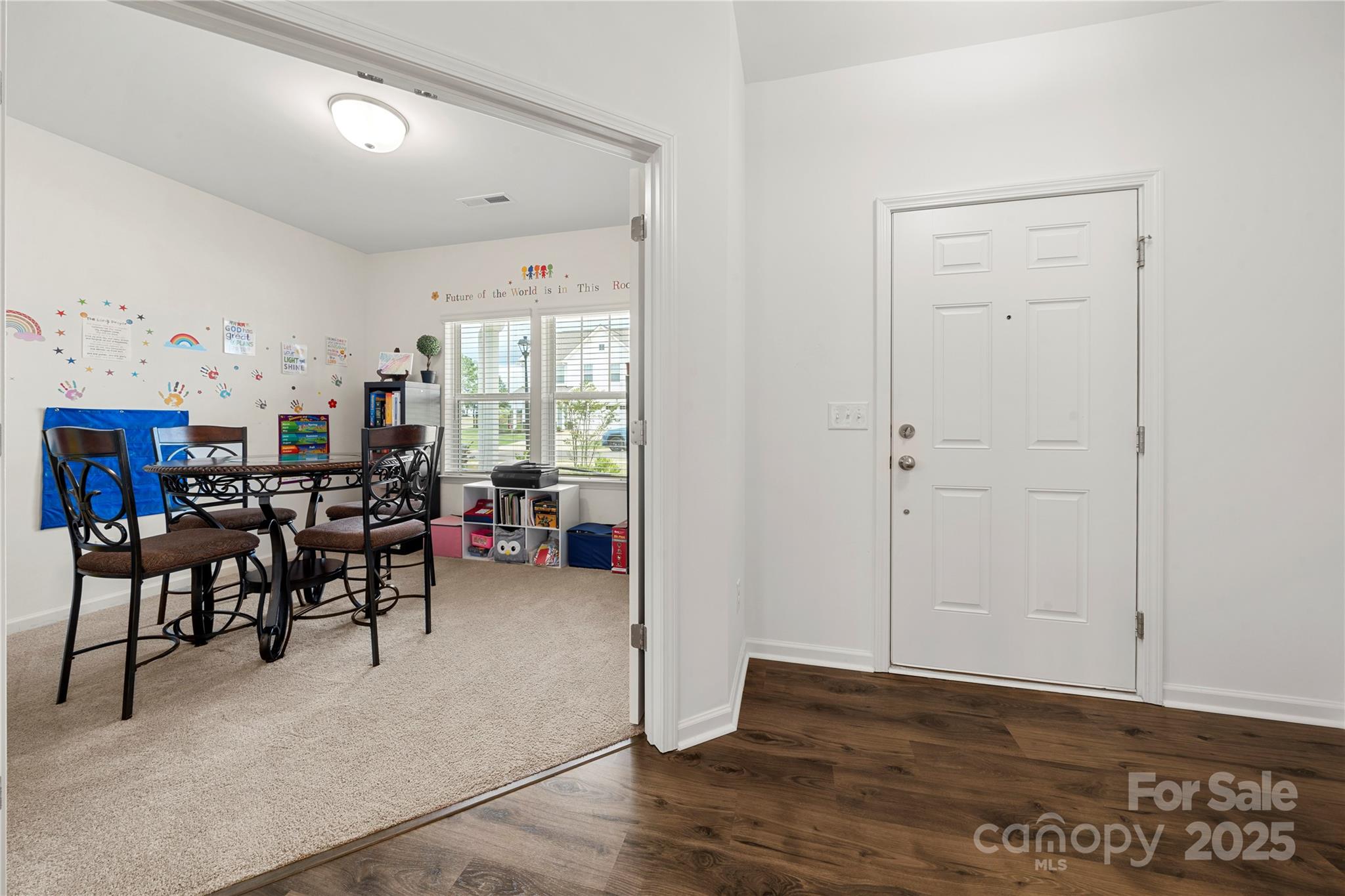 12053 Sam Snead Court Lancaster, SC 29720 - Photo 3 of 48 a view of a livingroom with furniture and workspace