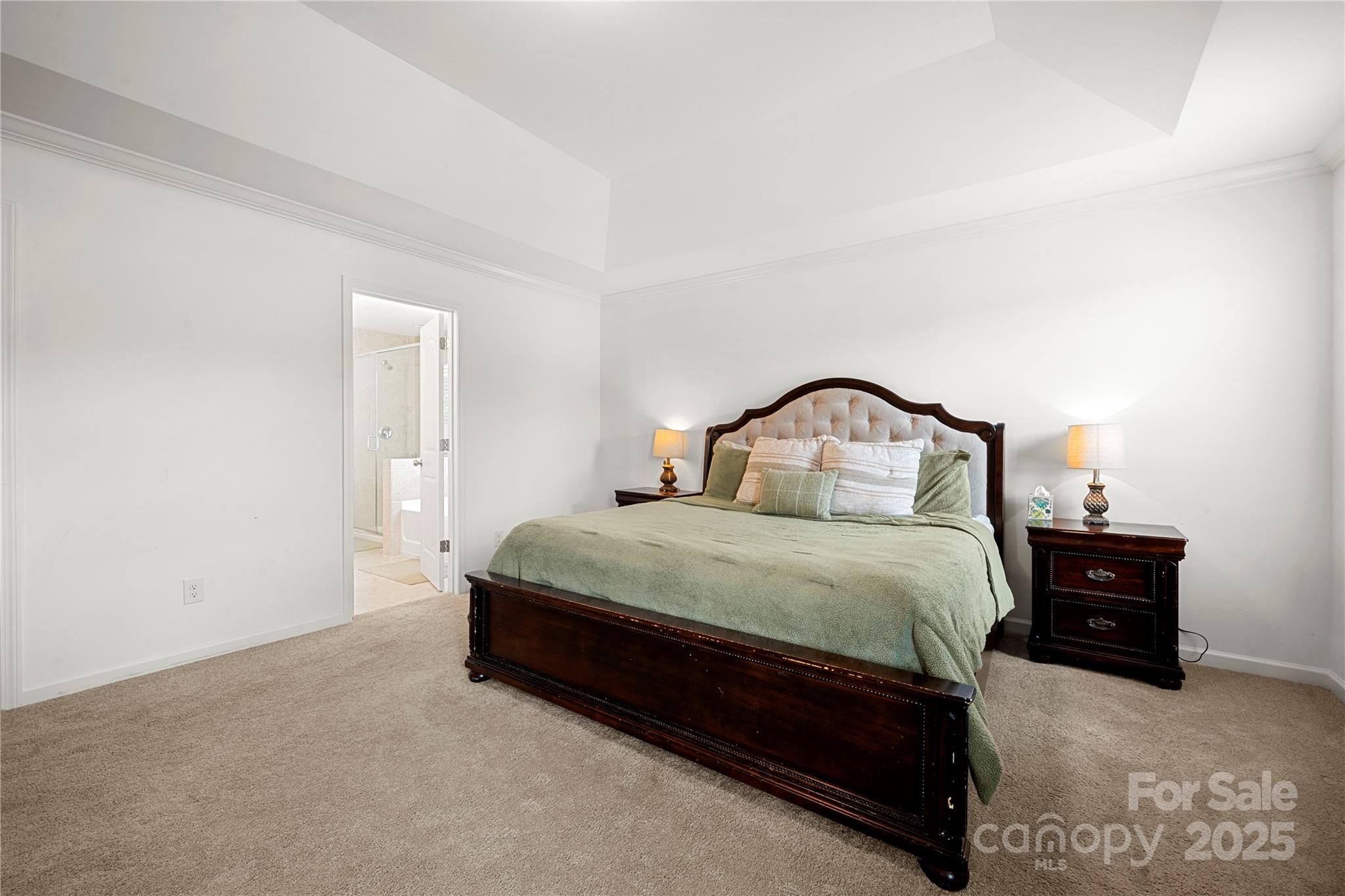 12053 Sam Snead Court Lancaster, SC 29720 - Photo 35 of 48 a bedroom with a bed and a night stand
