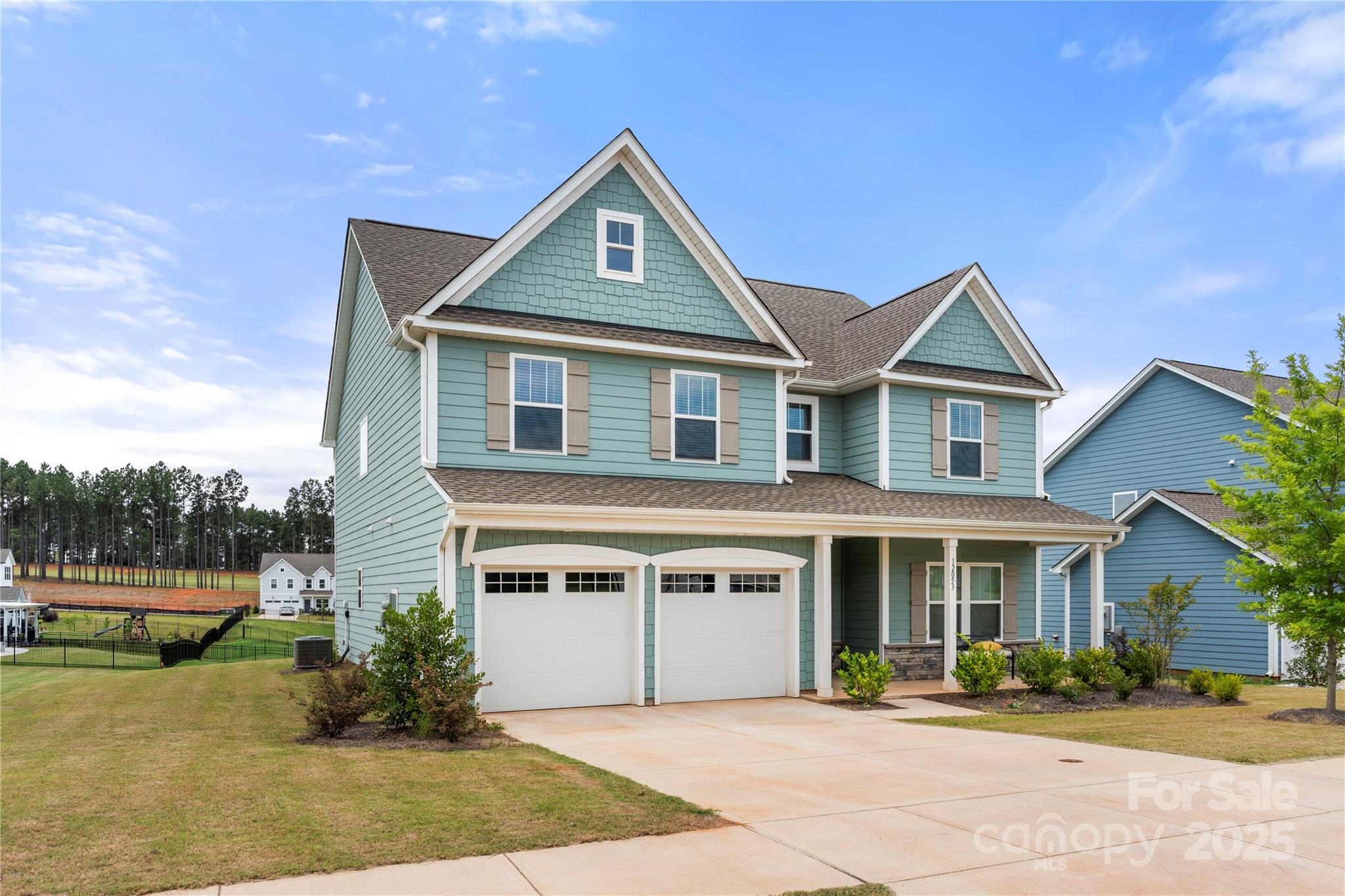 12053 Sam Snead Court Lancaster, SC 29720 - Photo 43 of 48 a front view of a house with a yard