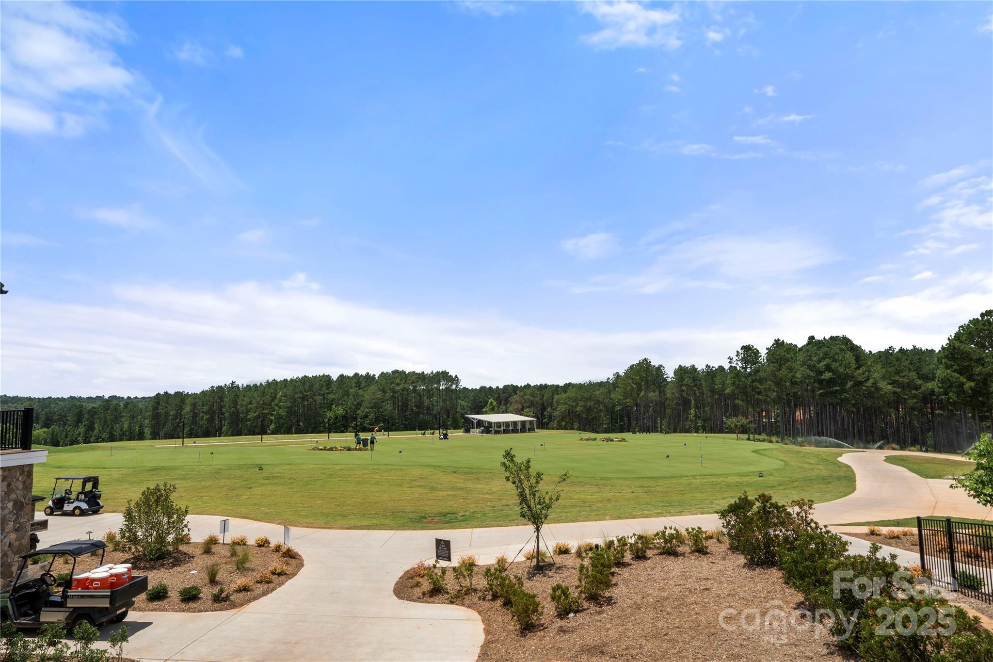 12053 Sam Snead Court Lancaster, SC 29720 - Photo 47 of 48 a view of a lake with outdoor space and outdoor seating