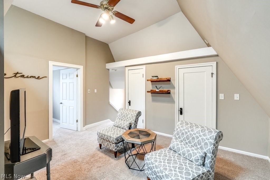 16010 Fernway Road Cleveland, OH 44120 - Photo 22 of 30 Sitting room with lofted ceiling, light carpet, and ceiling fan