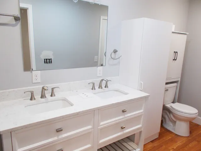 a bathroom with a bathtub and a shower