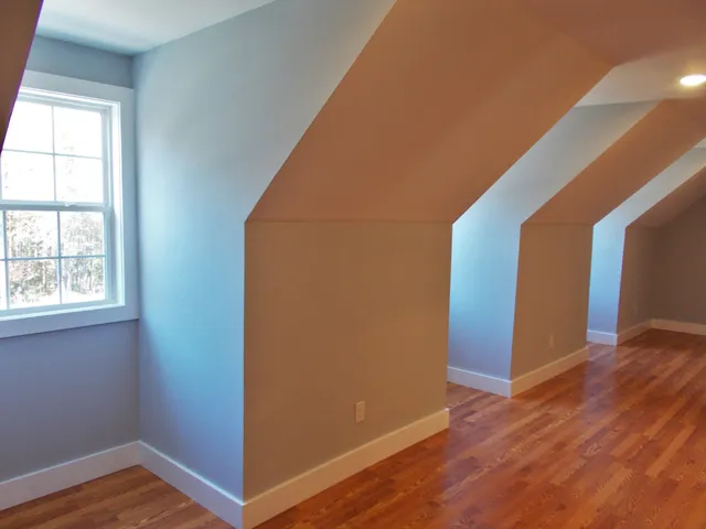 a view of a backyard of the house