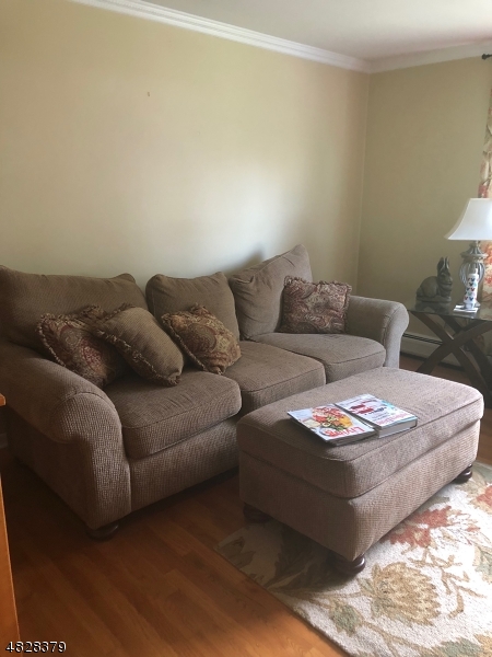 79 Rock Road, Unit 2 Hawthorne, NJ 07506 - Photo 11 of 13 a living room with furniture and a couch
