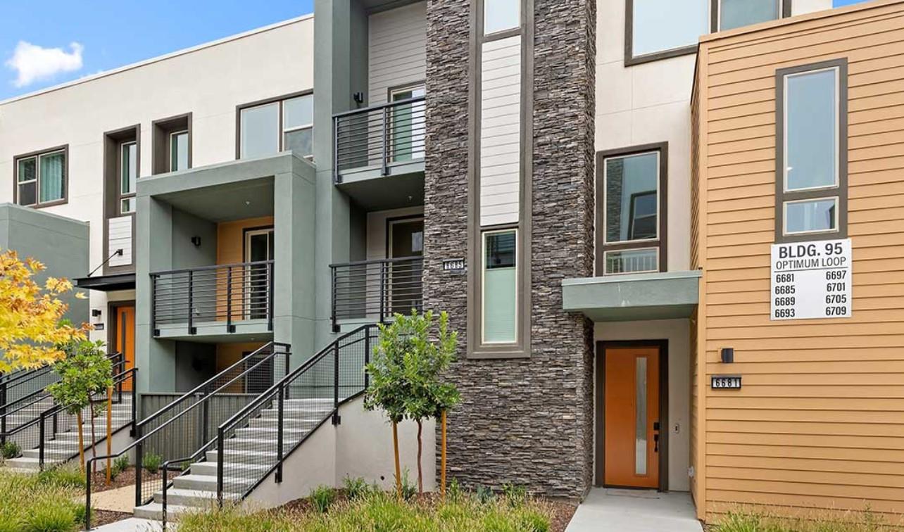 6681 Optimum Loop San Jose, CA 95119 - Photo 1 of 33 a front view of a house with a yard