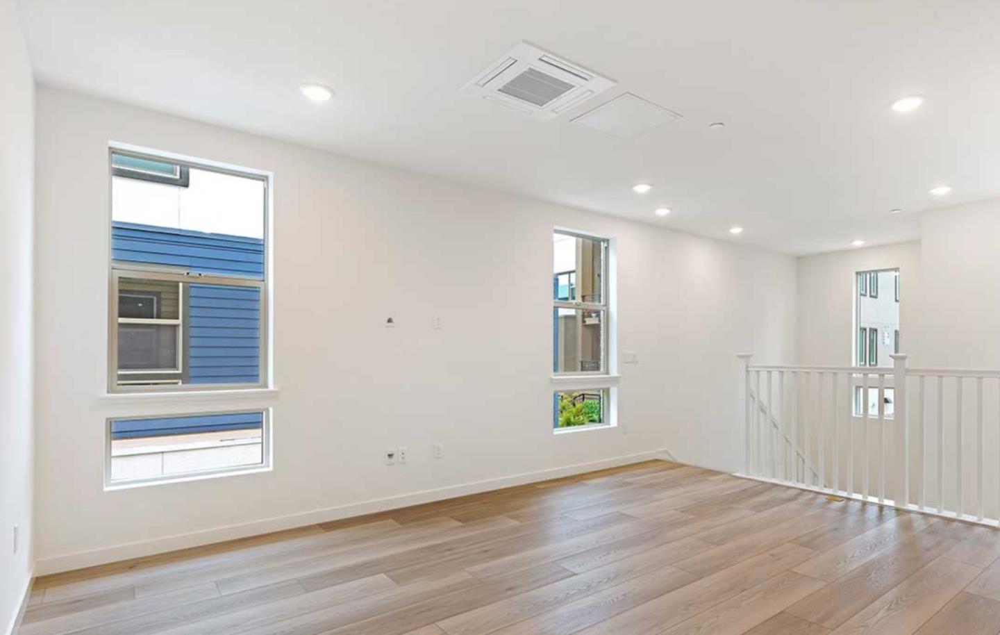 6681 Optimum Loop San Jose, CA 95119 - Photo 11 of 33 a view of an empty room with wooden floor and a window
