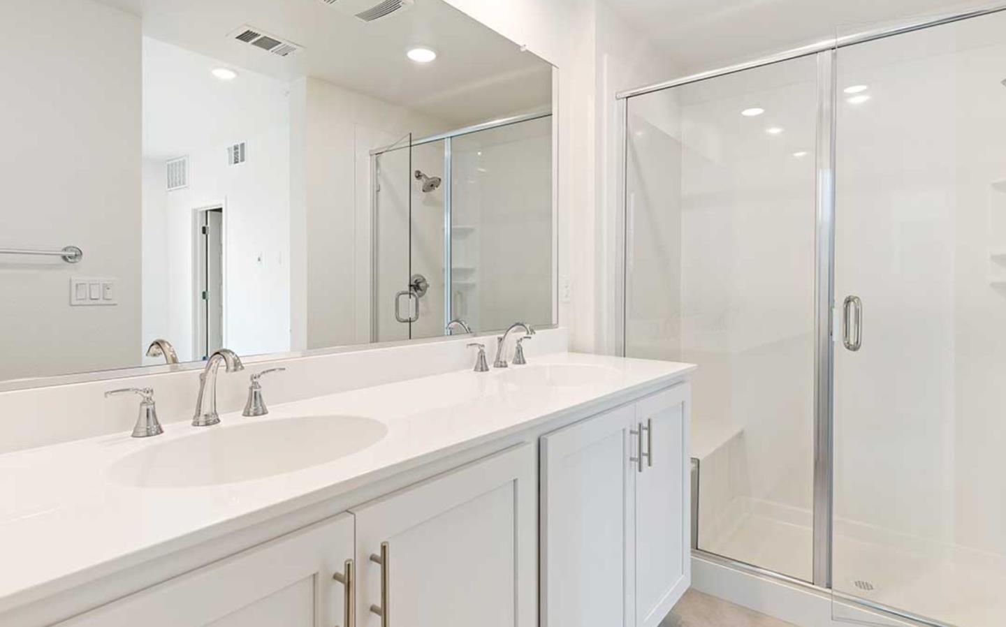 6681 Optimum Loop San Jose, CA 95119 - Photo 23 of 33 a bathroom with a sink and a mirror