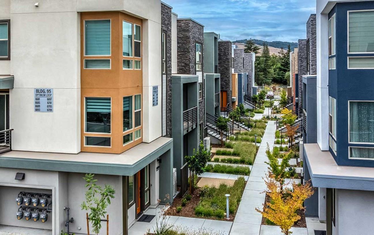 6681 Optimum Loop San Jose, CA 95119 - Photo 5 of 33 a front view of a multi story residential apartment building