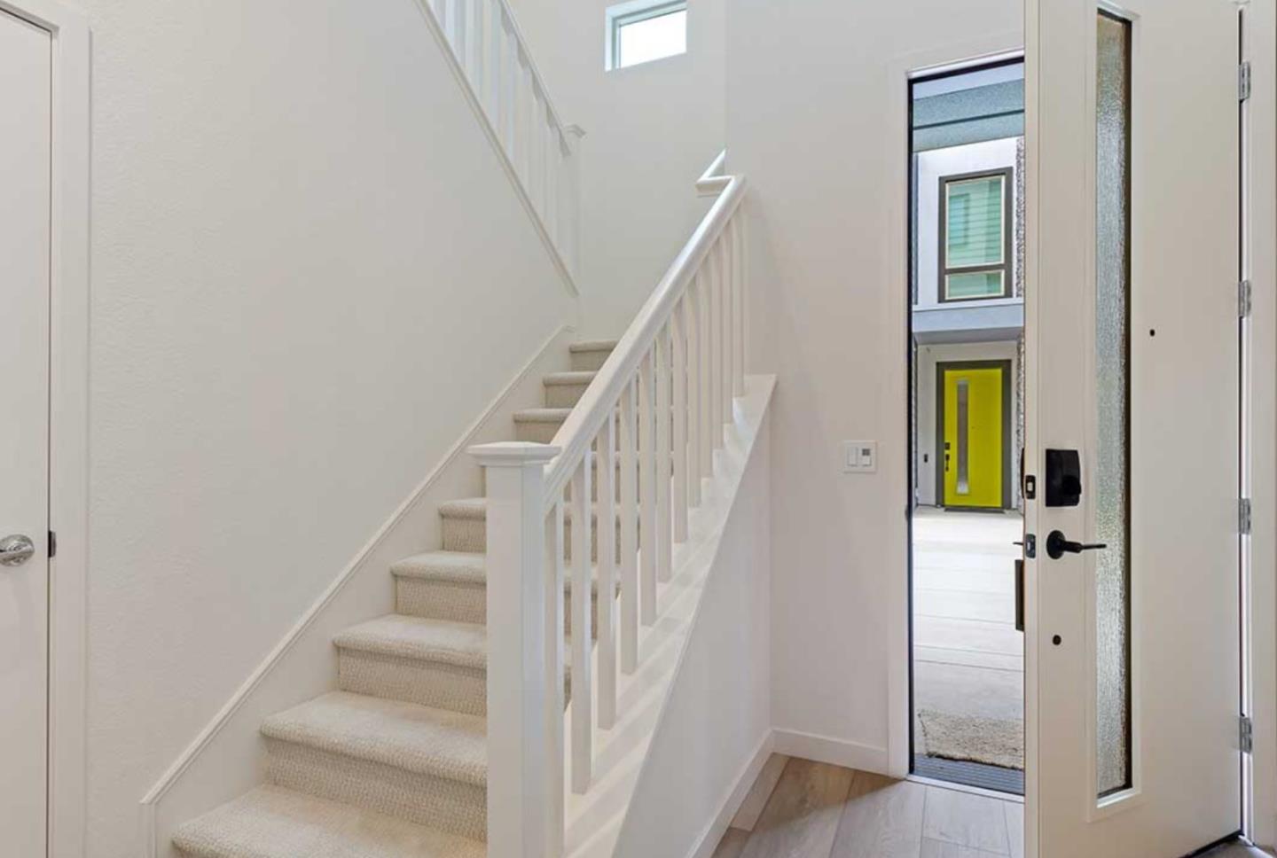 6681 Optimum Loop San Jose, CA 95119 - Photo 6 of 33 a view of staircase with wooden floor and staircase