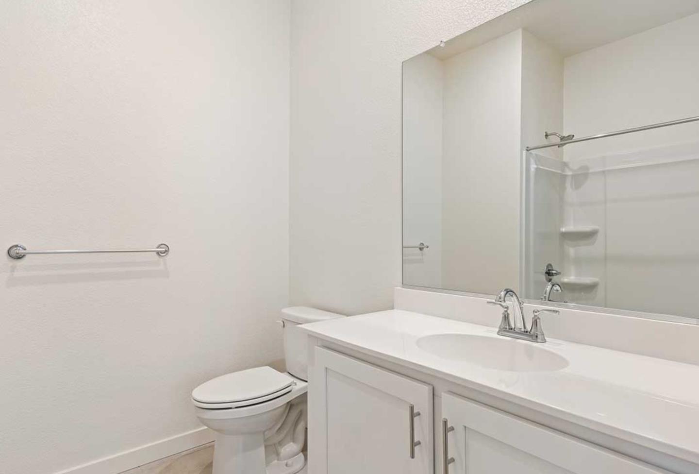 6681 Optimum Loop San Jose, CA 95119 - Photo 8 of 33 a bathroom with a sink toilet and vanity