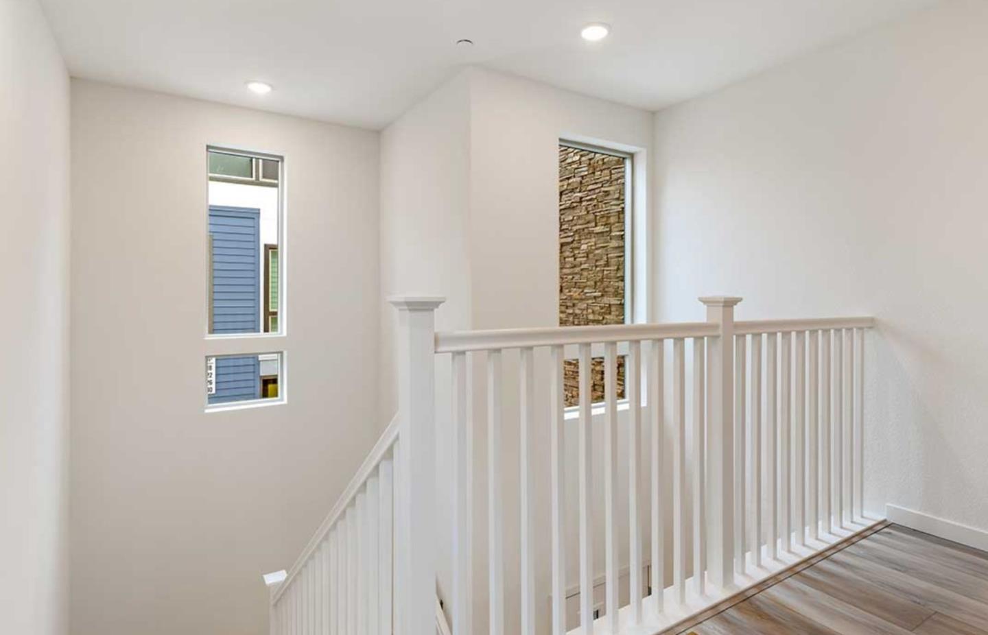 6681 Optimum Loop San Jose, CA 95119 - Photo 10 of 33 a view of a hallway with windows