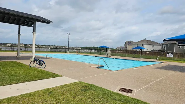 a view of a swimming pool and outdoor space