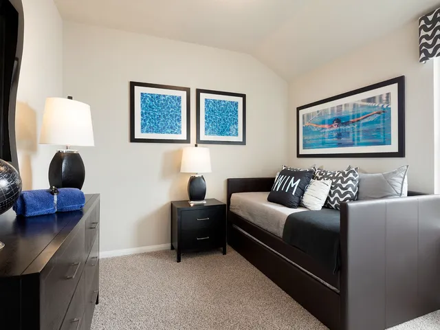 a view of a dining room with furniture and window