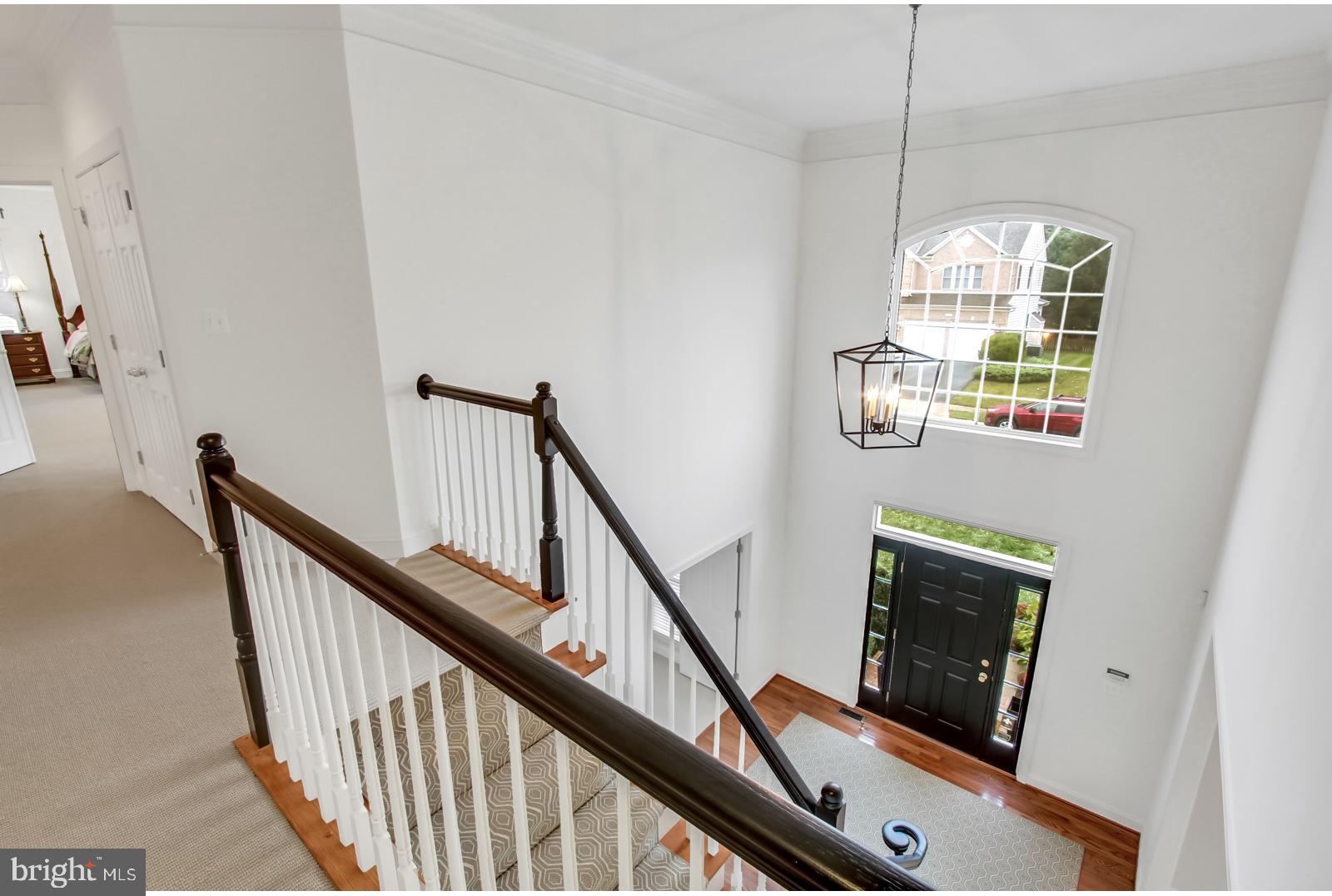 603 Hawkshead Road Lutherville-Timonium, MD 21093 - Photo 16 of 28 ELEGANT STAIRCASE OVERLOOKS LARGE FOYER