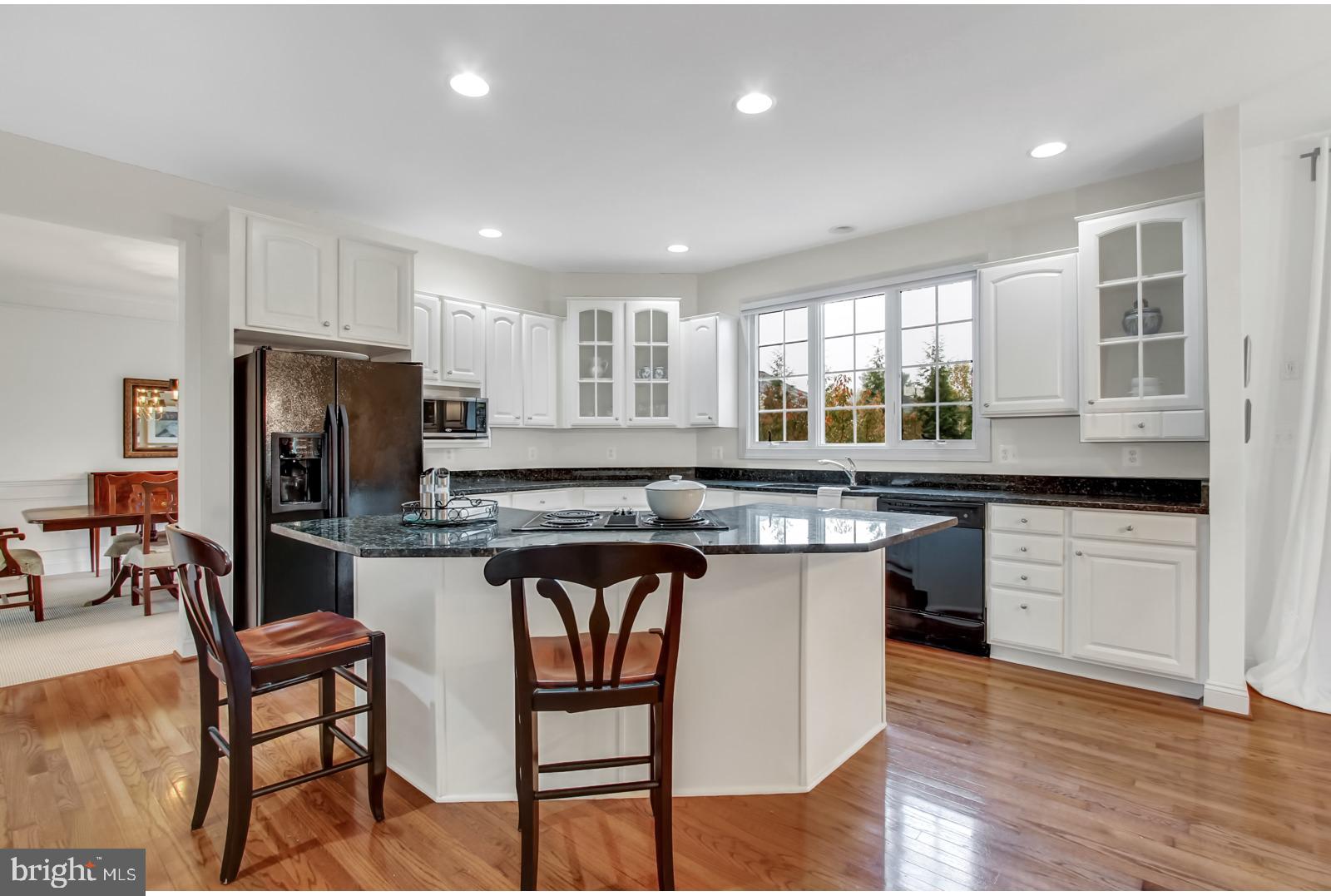 603 Hawkshead Road Lutherville-Timonium, MD 21093 - Photo 8 of 28 LARGE GRANITE AND CHEERFUL WHITE KITCHEN