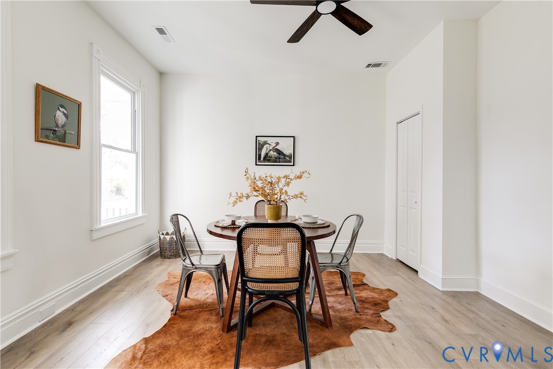 2413 Ingram Avenue Richmond, VA 23224 - Photo 12 of 43 a view of a dining room with furniture and window