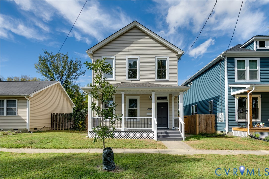 2413 Ingram Avenue Richmond, VA 23224 - Photo 2 of 43 a front view of a house with a yard