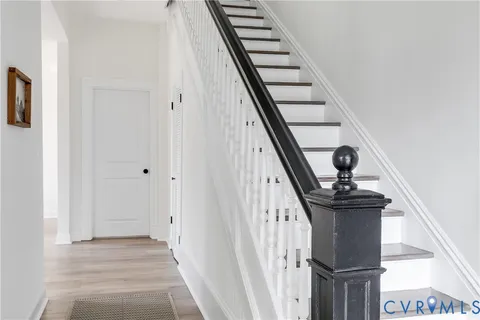 a view of an entryway with staircase