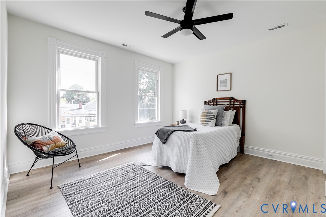 2413 Ingram Avenue Richmond, VA 23224 - Photo 29 of 43 a living room with furniture and a window