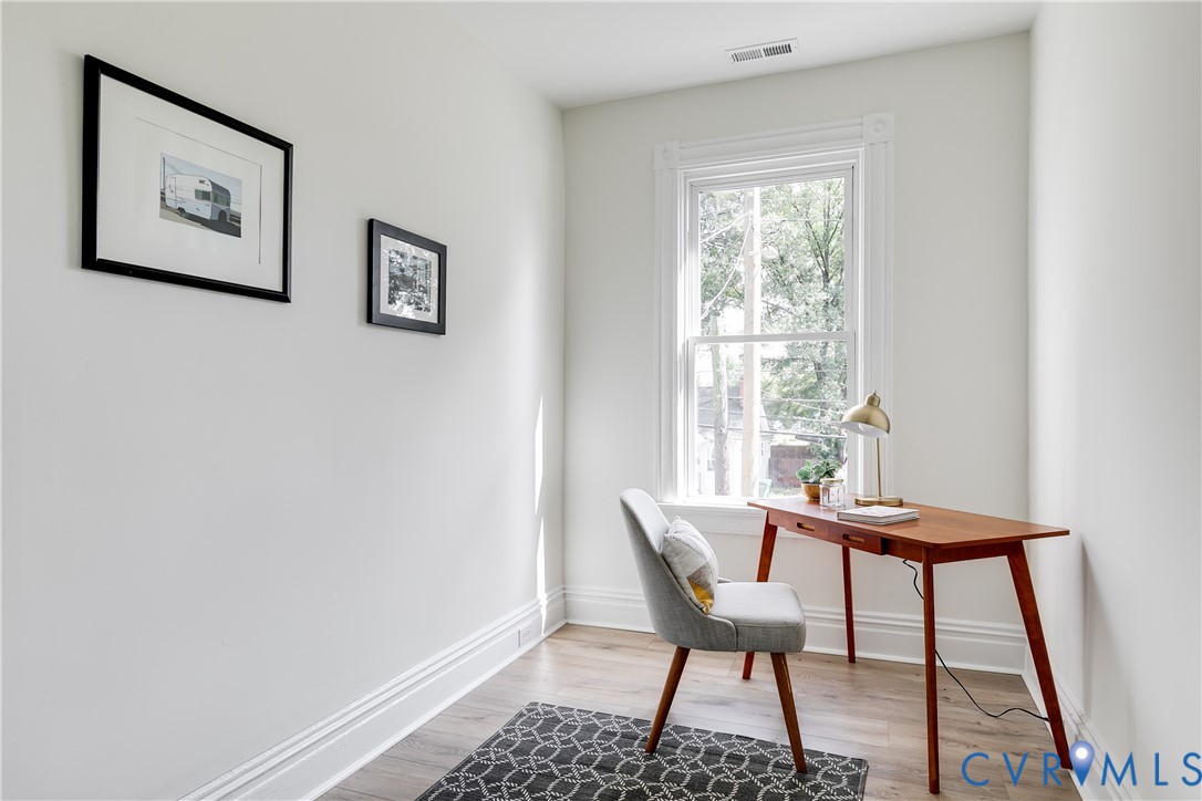 2413 Ingram Avenue Richmond, VA 23224 - Photo 37 of 43 a view of a room with a table and chairs