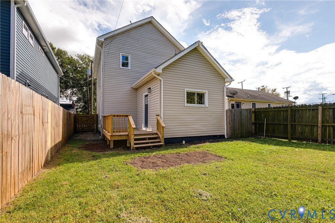 2413 Ingram Avenue Richmond, VA 23224 - Photo 43 of 43 a view of a backyard with a small cabin