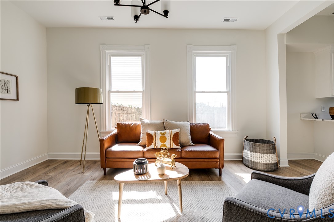 2413 Ingram Avenue Richmond, VA 23224 - Photo 9 of 43 a living room with furniture and a window