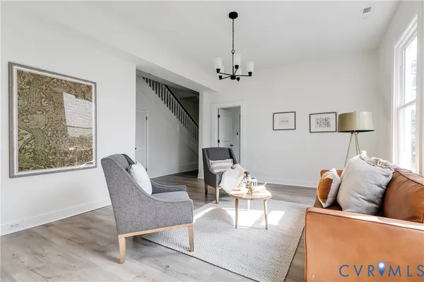 a living room with furniture and a window