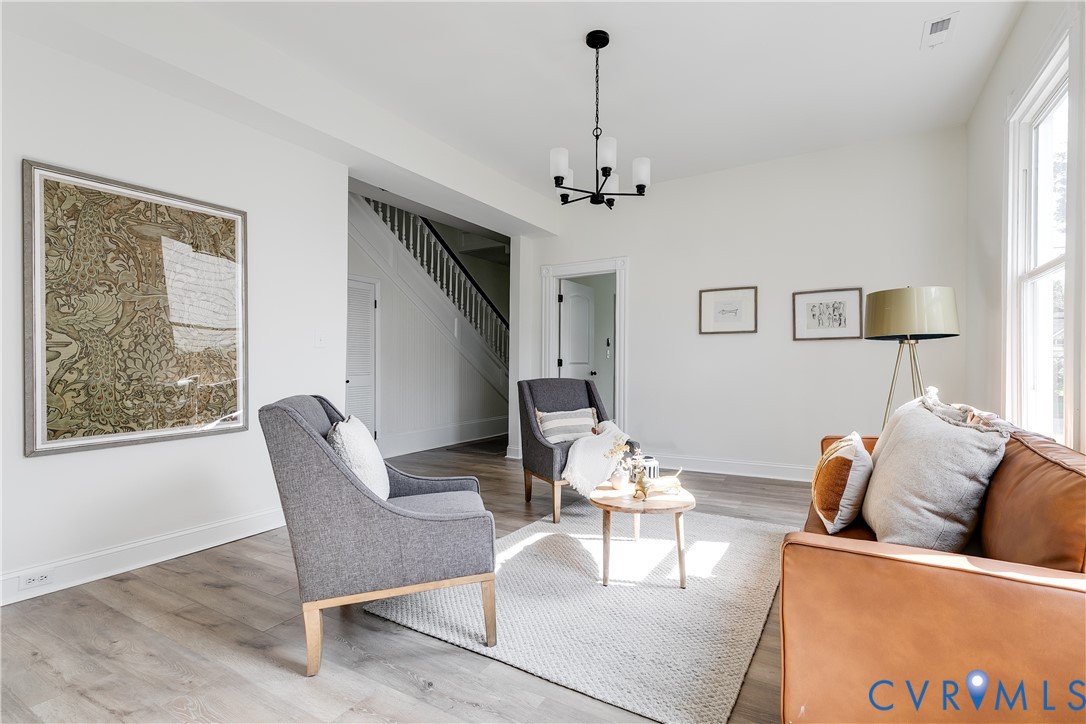 2413 Ingram Avenue Richmond, VA 23224 - Photo 10 of 43 a living room with furniture and a window