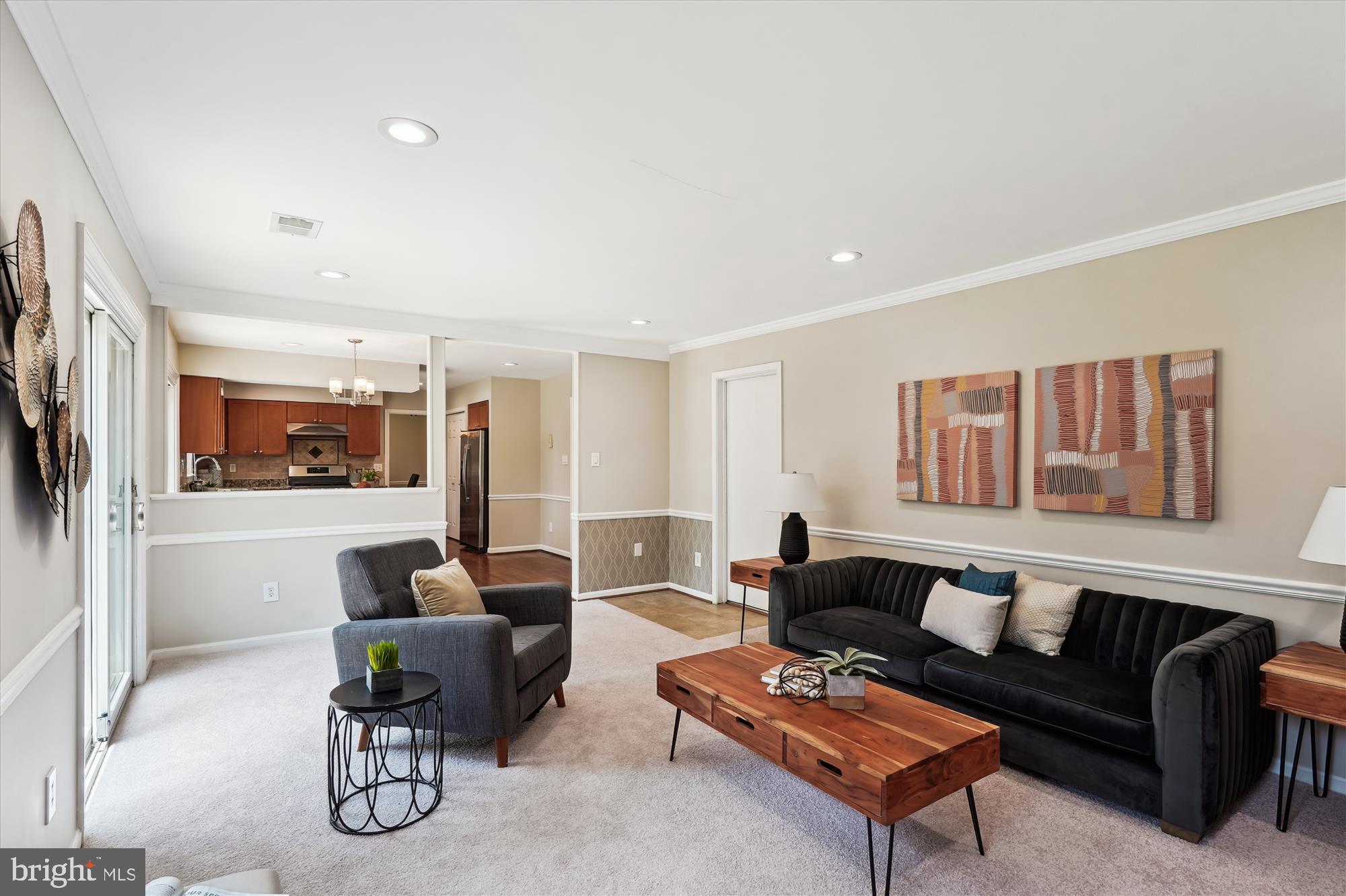 5427 Rilian Court Burke, VA 22015 - Photo 17 of 63 a living room with furniture and a couch