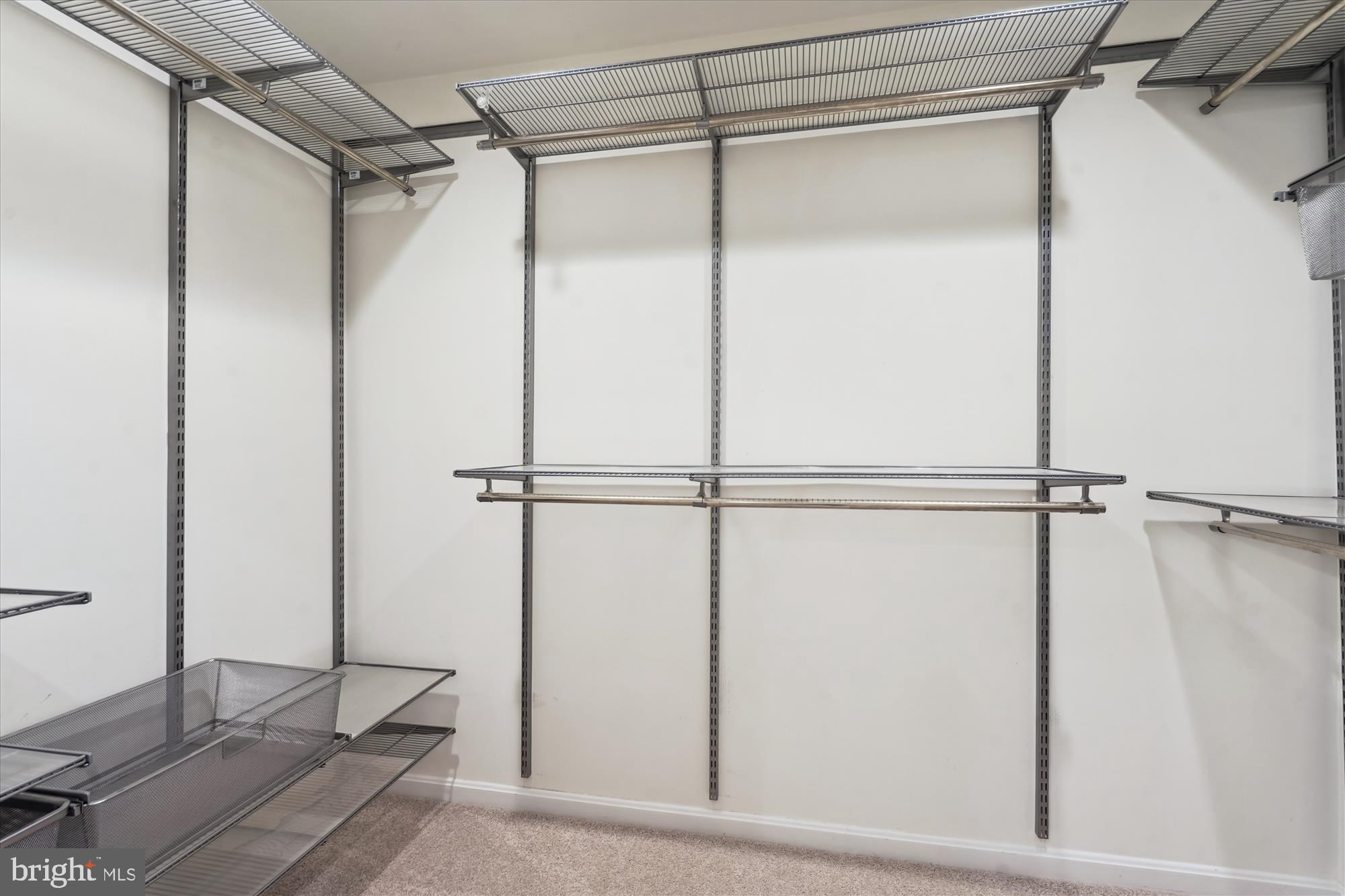 5427 Rilian Court Burke, VA 22015 - Photo 24 of 63 a view of a room with racks on the wall