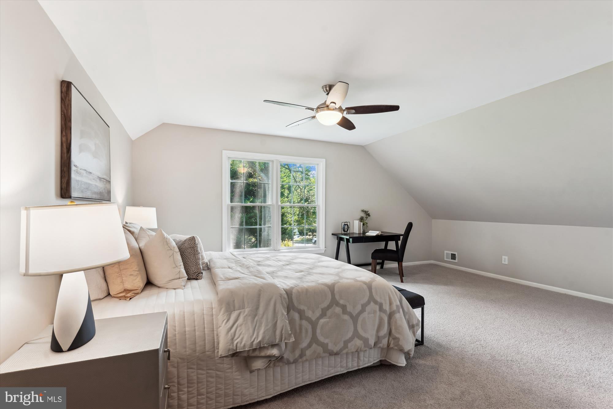 5427 Rilian Court Burke, VA 22015 - Photo 27 of 63 a bedroom with a bed and a table