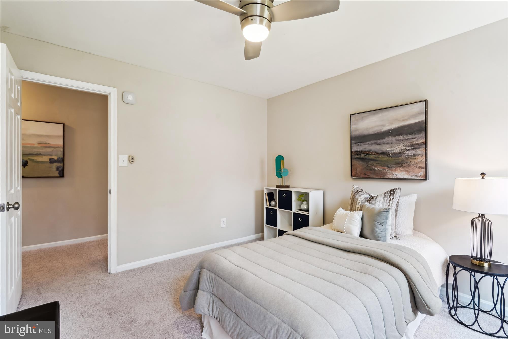 5427 Rilian Court Burke, VA 22015 - Photo 29 of 63 a bedroom with a bed and dresser