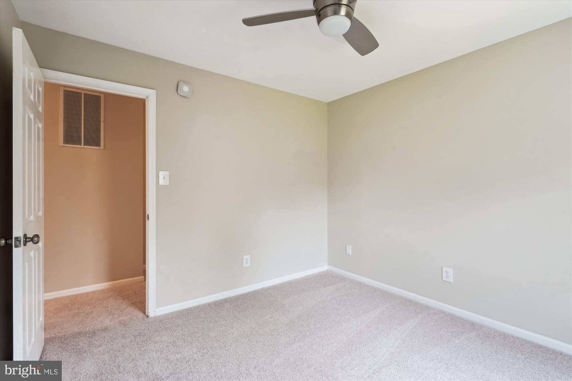5427 Rilian Court Burke, VA 22015 - Photo 33 of 63 an empty room with a empty space and windows