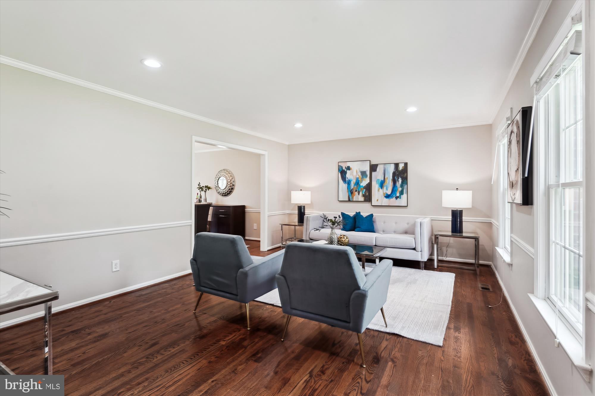 5427 Rilian Court Burke, VA 22015 - Photo 4 of 63 a living room with furniture and a wooden floor